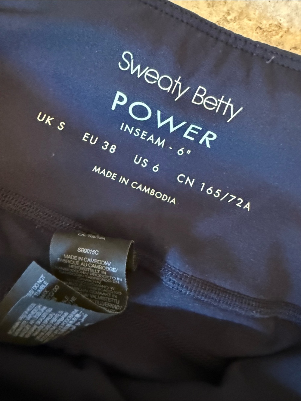 Sweaty Betty Navy 6” Bike Shorts with Light Blue Trim - Picture 3 of 3